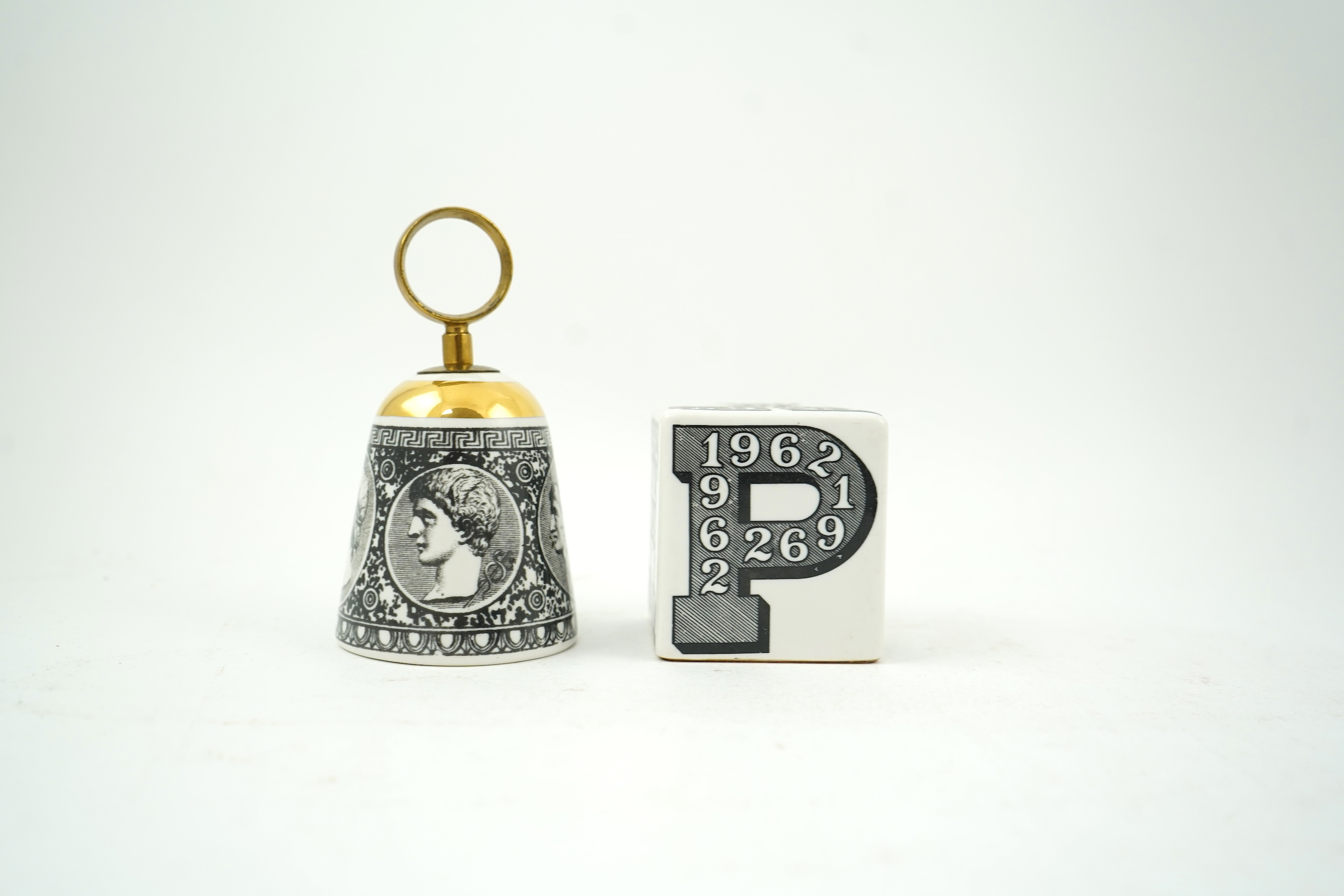 Piero Fornasetti (Italian, 1913-1988): A collection of Fornasetti desk items and dishes